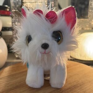 This is a Coco Surprise plush toy, specifically "Silvy the Puppy". NWT